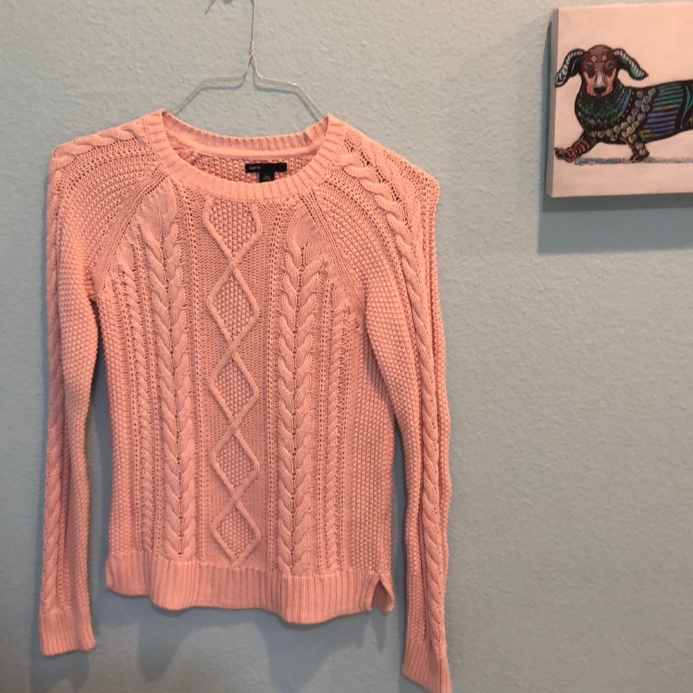 Pink knitted sweater